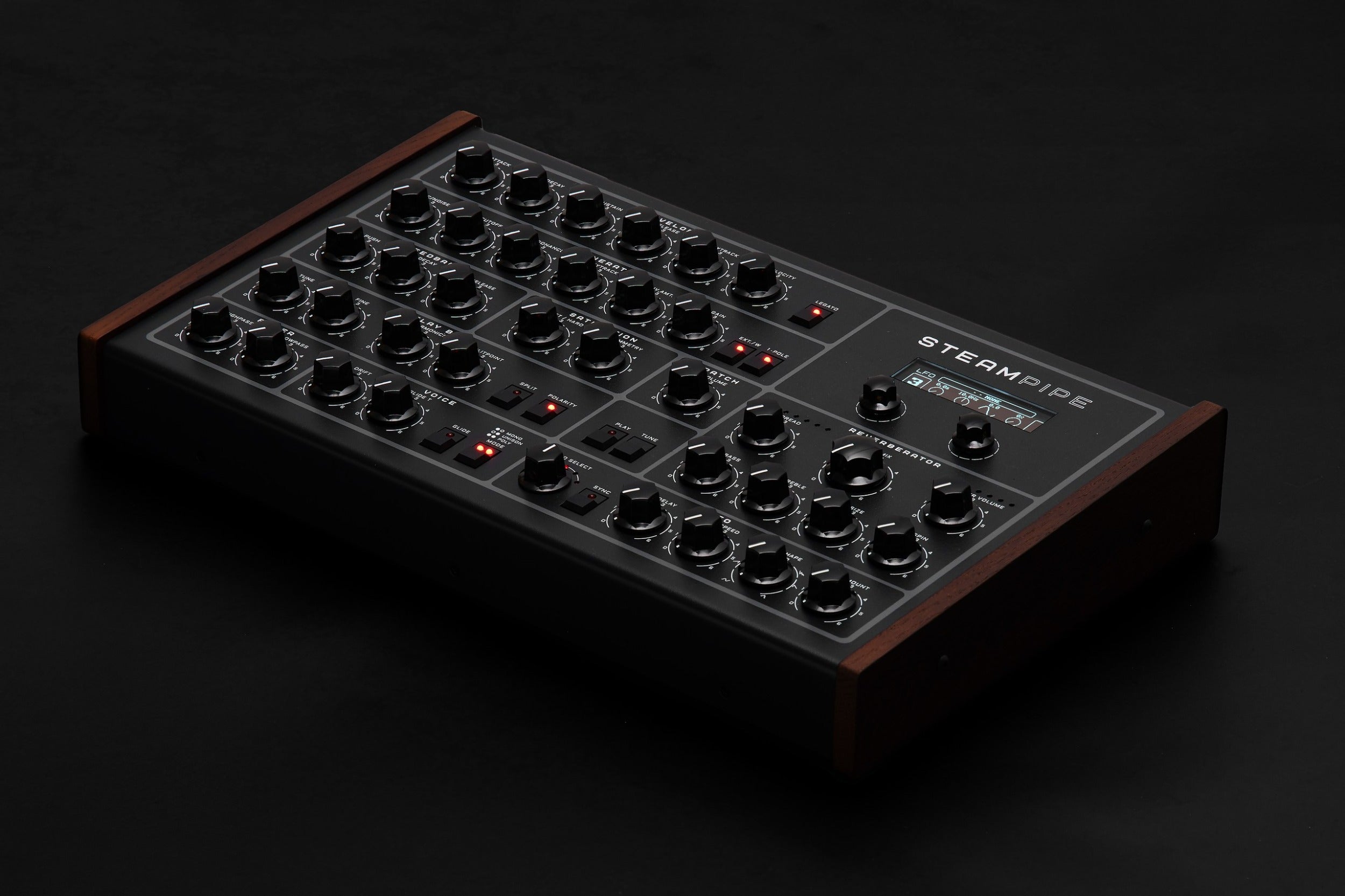 Erica Synths Steampipe desktop synthesizer with patch cables and control knobs on a black panel.