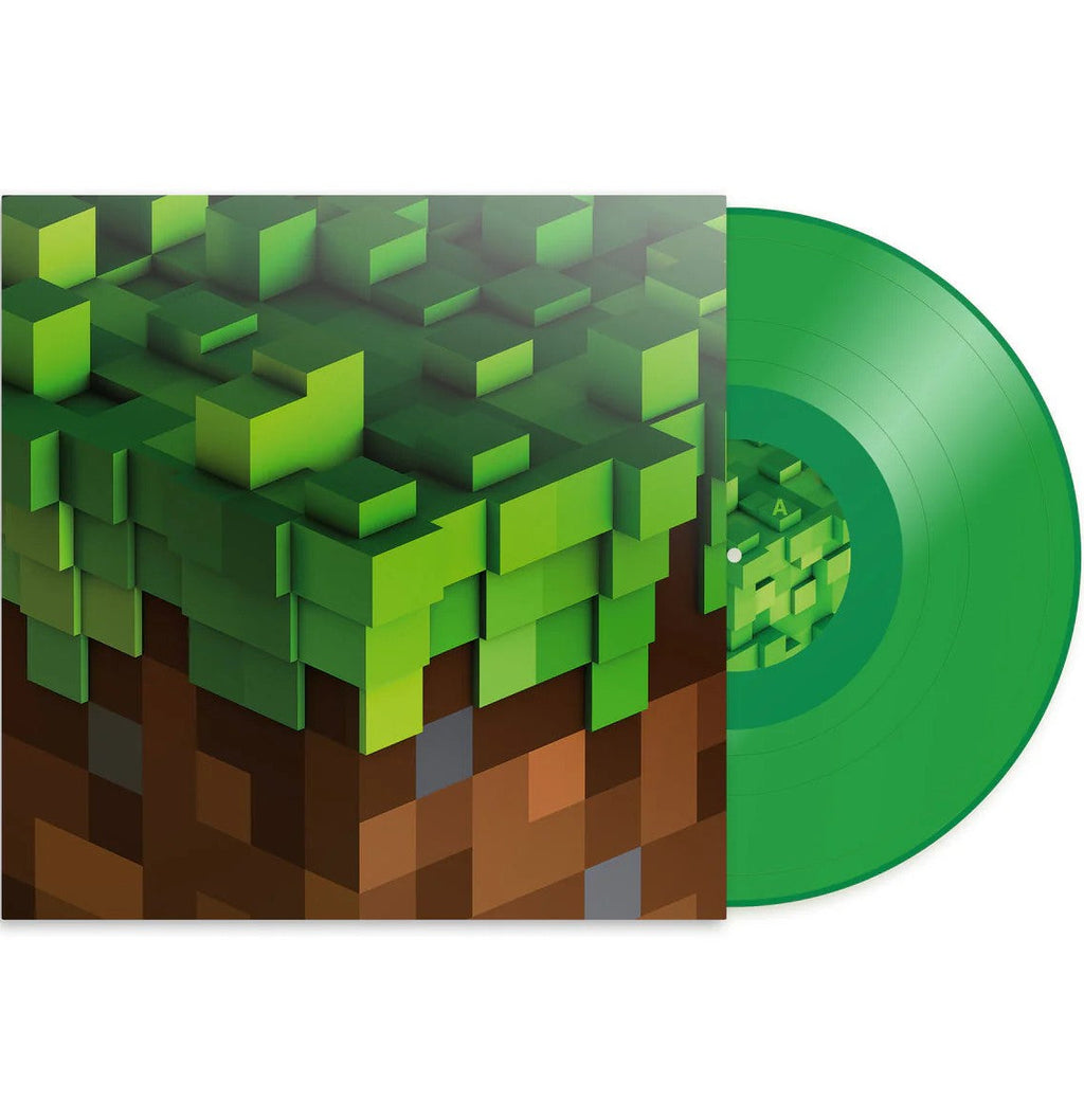 Green transparent vinyl LP of C418's Minecraft Volume Alpha electronic album by Ghostly International, with visible record grooves and cover art.