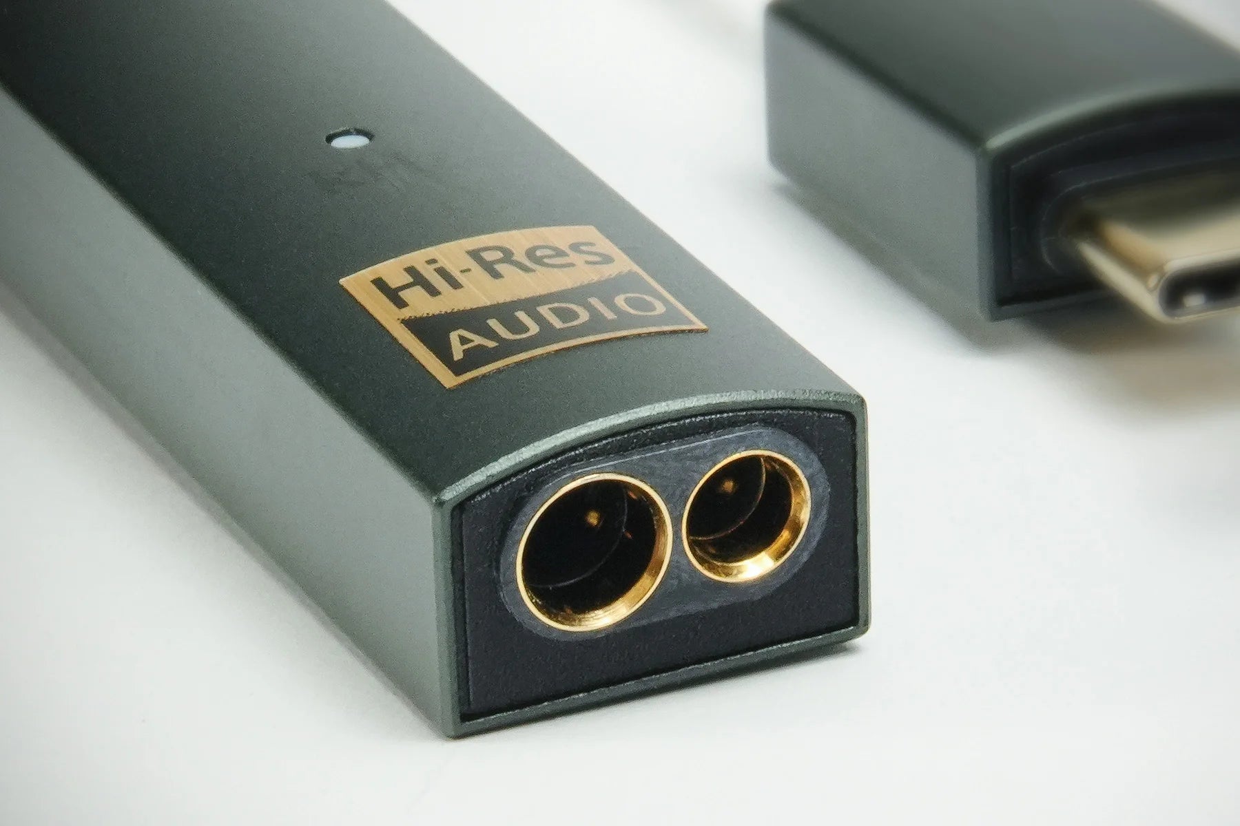 iFi Audio Go Link Max headphone amplifier and DAC with compact design and multiple input options, black color, front view.