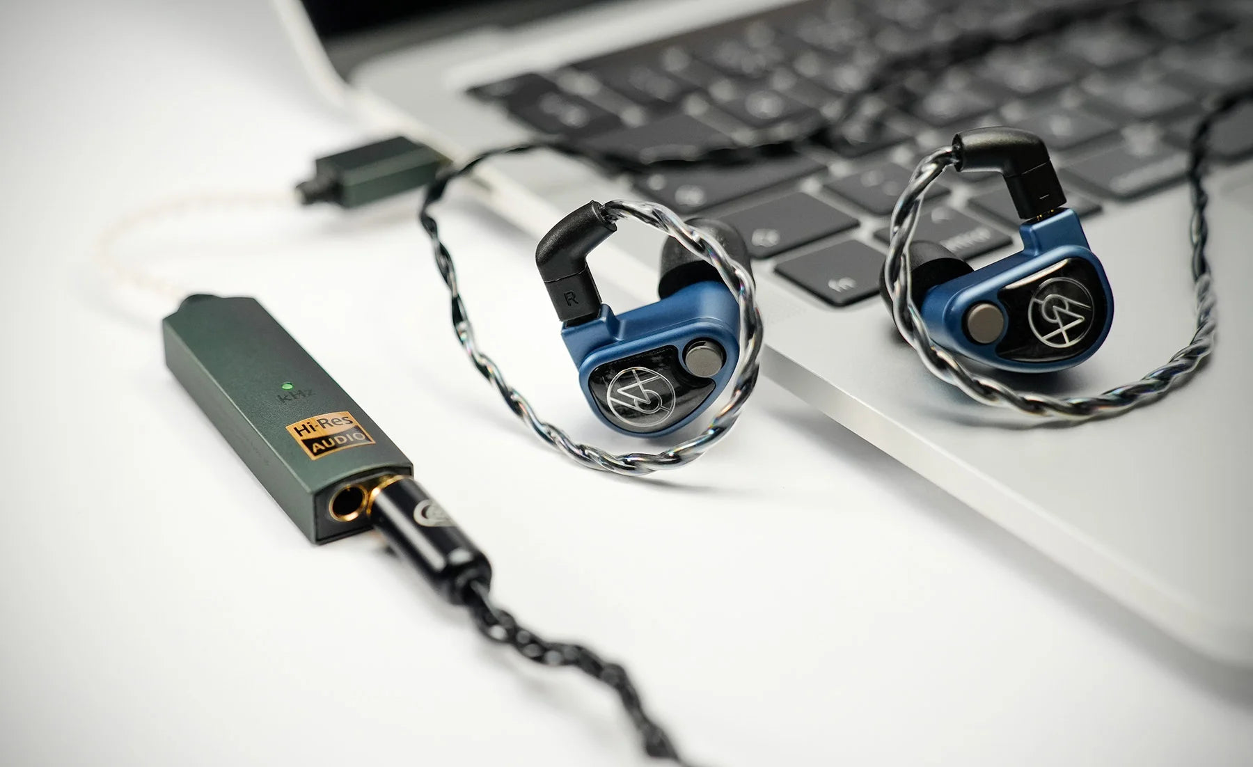 iFi Audio Go Link Max headphone amplifier and DAC showing its compact design with ports and controls on the front panel.