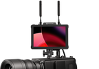 Hollyland Pyro Transmission Kit video monitors with multiple screens and control buttons, used for professional video transmission.