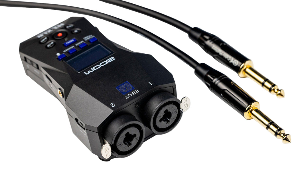 Zoom H1 XLR digital recorder with XLR input and compact design, shown with buttons and ports on a sleek black device.