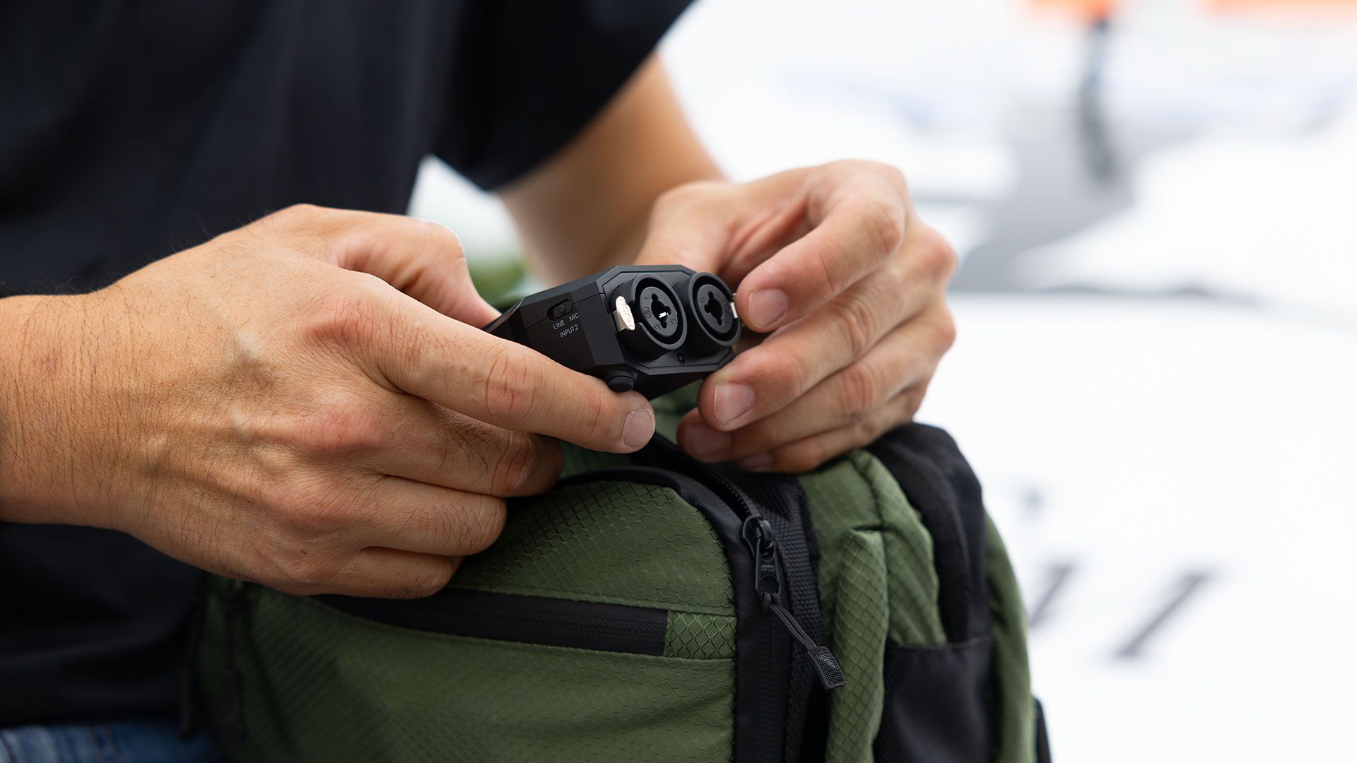 Zoom H1 XLR digital recorder with XLR input and compact design, showing front view with controls and display screen.
