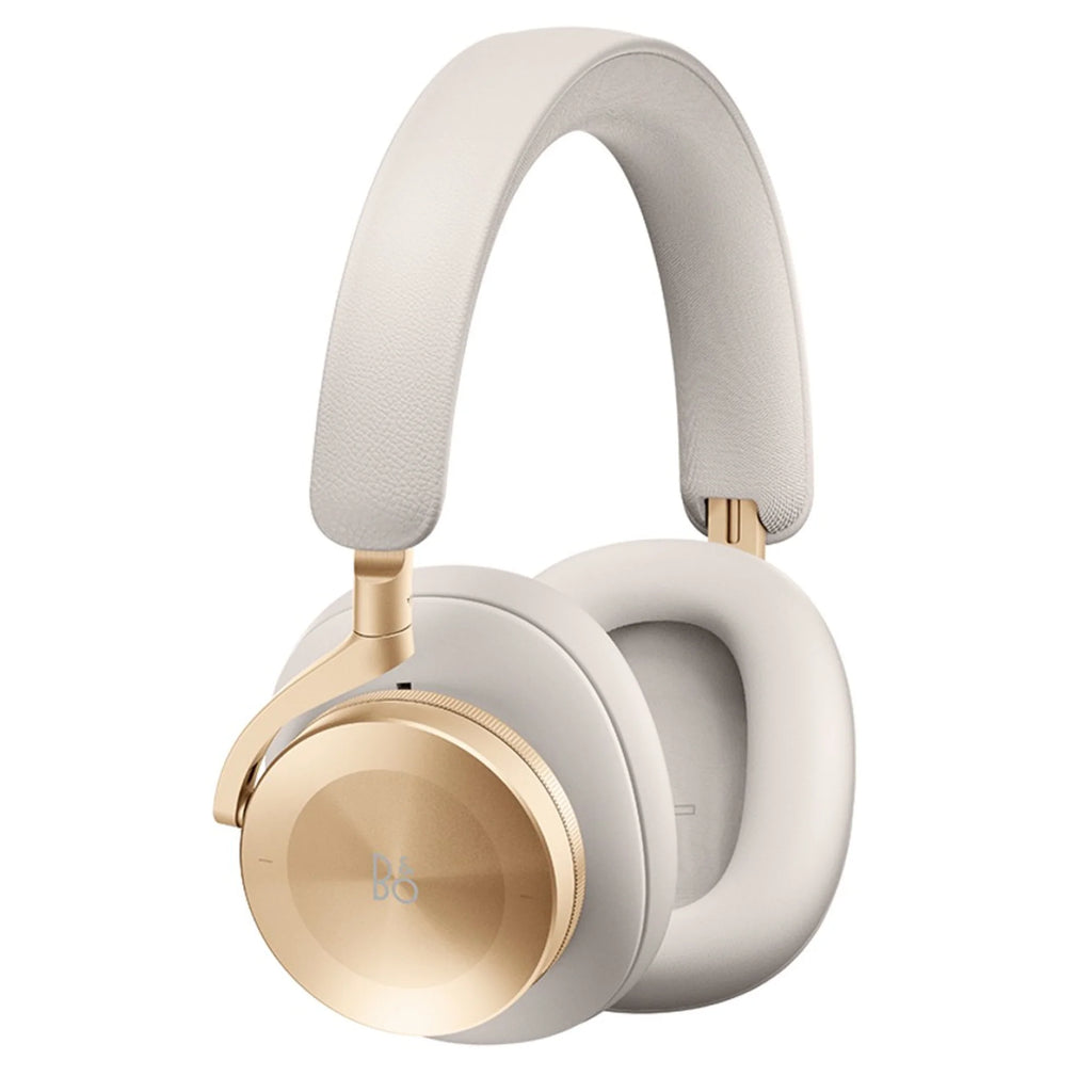 Bang & Olufsen Beoplay H95 wireless headphones in gold, showing sleek over-ear design with plush ear cushions.