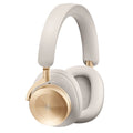 Bang & Olufsen Beoplay H95 wireless headphones in gold, showing sleek over-ear design with plush ear cushions.