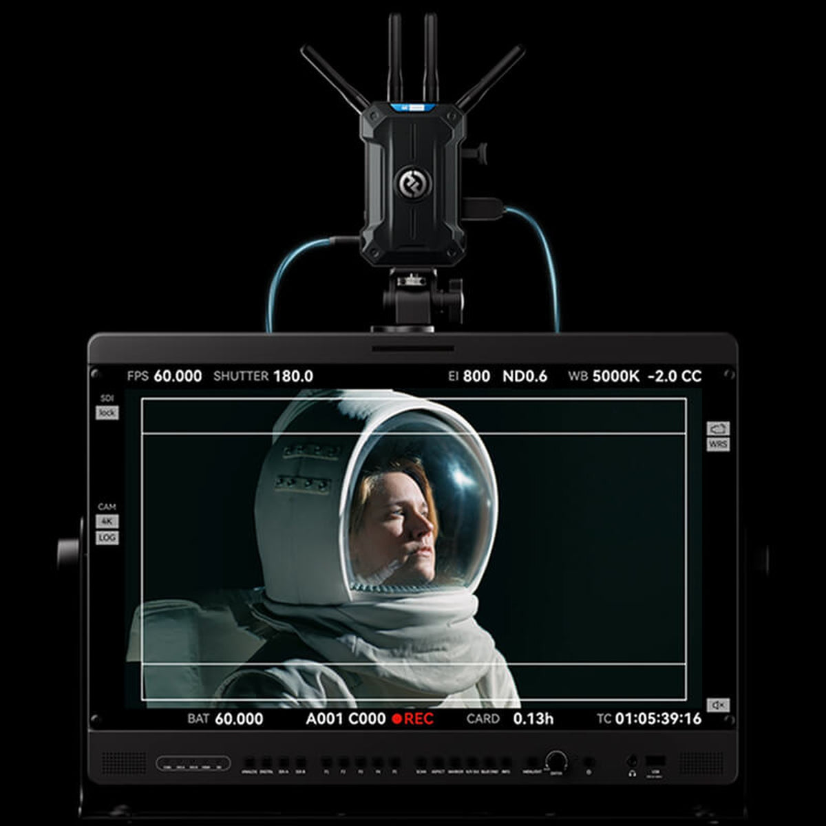 Hollyland Pyro Ultra receiver on top of a field monitor