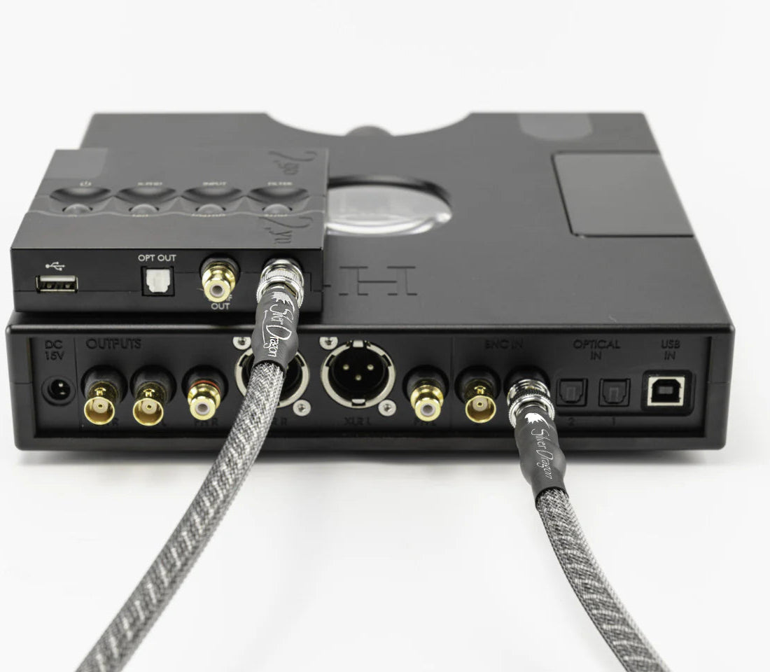 Chord Electronics Hugo TT2 headphone amplifier and DAC with sleek black finish and multiple input ports on front panel.