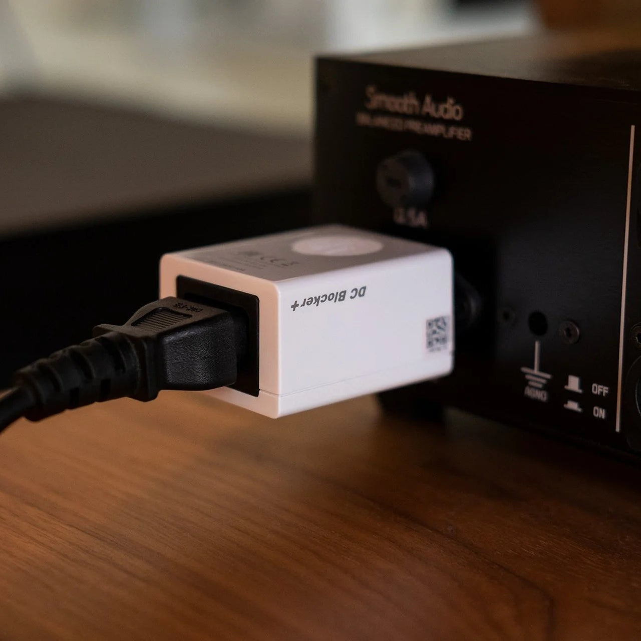 SilentPower DC Blocker+ noise filter in a sleek design, ideal for reducing electrical noise in audio setups.