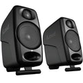 IK Multimedia iLoud Micro monitors, compact desktop speakers with sleek black design, ideal for professional audio monitoring.
