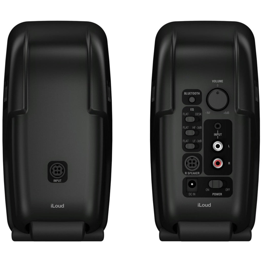 IK Multimedia iLoud Micro Monitors desktop speakers showing compact design with control knobs and speaker grille.