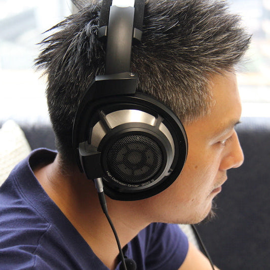 Sennheiser HD 800 S head-fi headphones with open-back design and plush ear cushions in a sleek black finish.