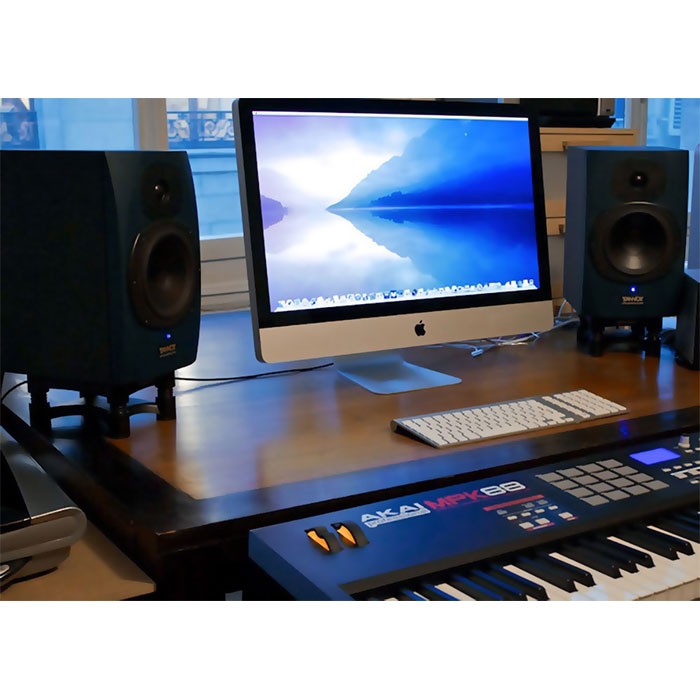 IsoAcoustics ISO-130 Studio Monitor Stands with adjustable height and sleek black design for optimal speaker positioning.