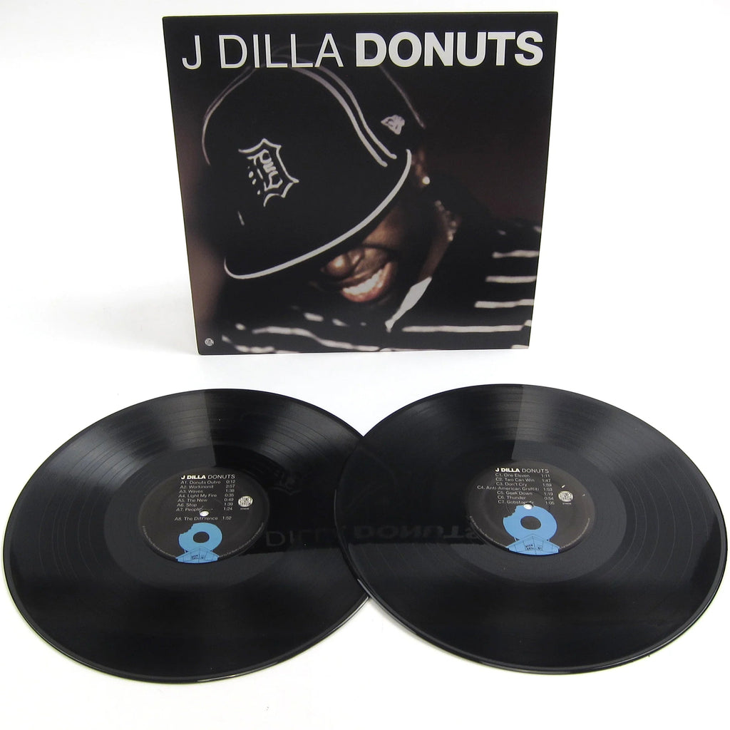 Black vinyl 2LP of J Dilla's Donuts album, featuring Hip-hop, Rap, and Trap music, released by Stones Throw Records.