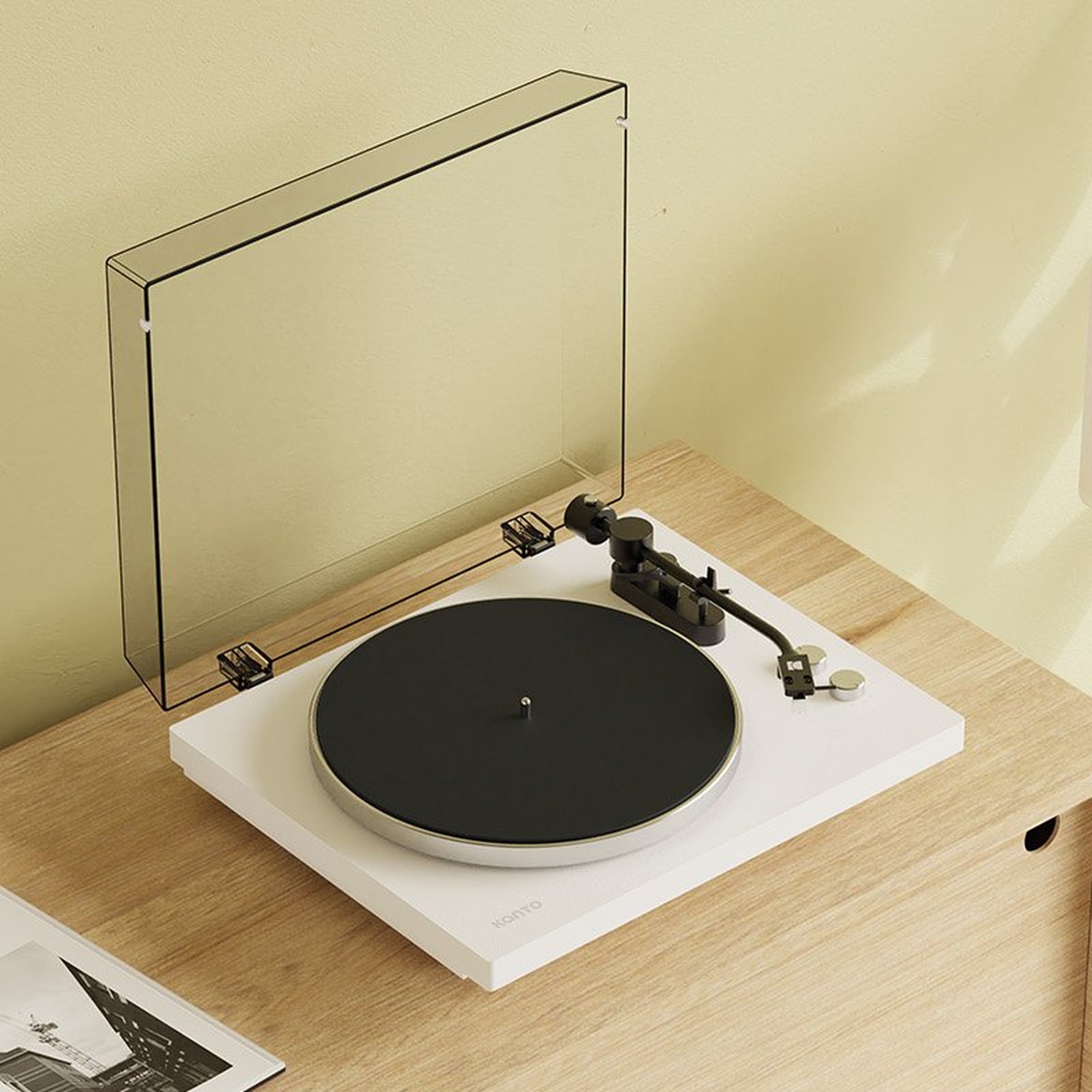 Kanto Audio OBI3 Gen 2 turntable, White, on a wooden console