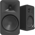 Kanto Audio Ora 4 desktop speakers with sleek black design and compact size, ideal for high-quality computer audio setup.