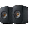 Pair of KEF LSX II active bookshelf speakers with sleek black finish, featuring compact design and high-quality audio drivers.