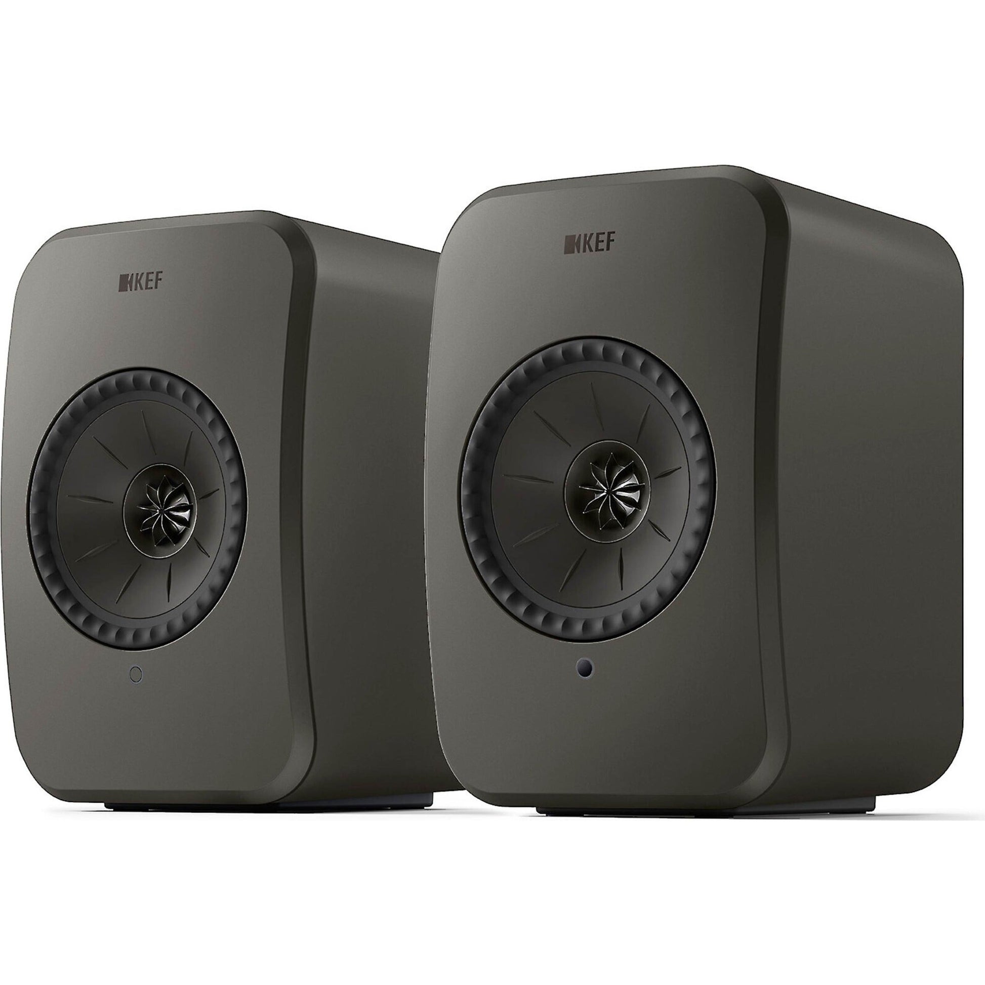 KEF LSX II LT active bookshelf speakers shown in a modern living room setup with sleek black design.