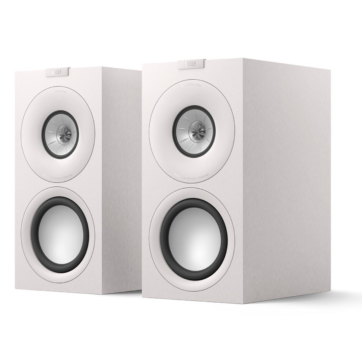 KEF Q Concerto Meta passive bookshelf speakers shown in a stylish home setup, highlighting their sleek design and compact size.
