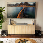 Klipsch Flexus Core 100 soundbar, with subwoofers under TV in condo.