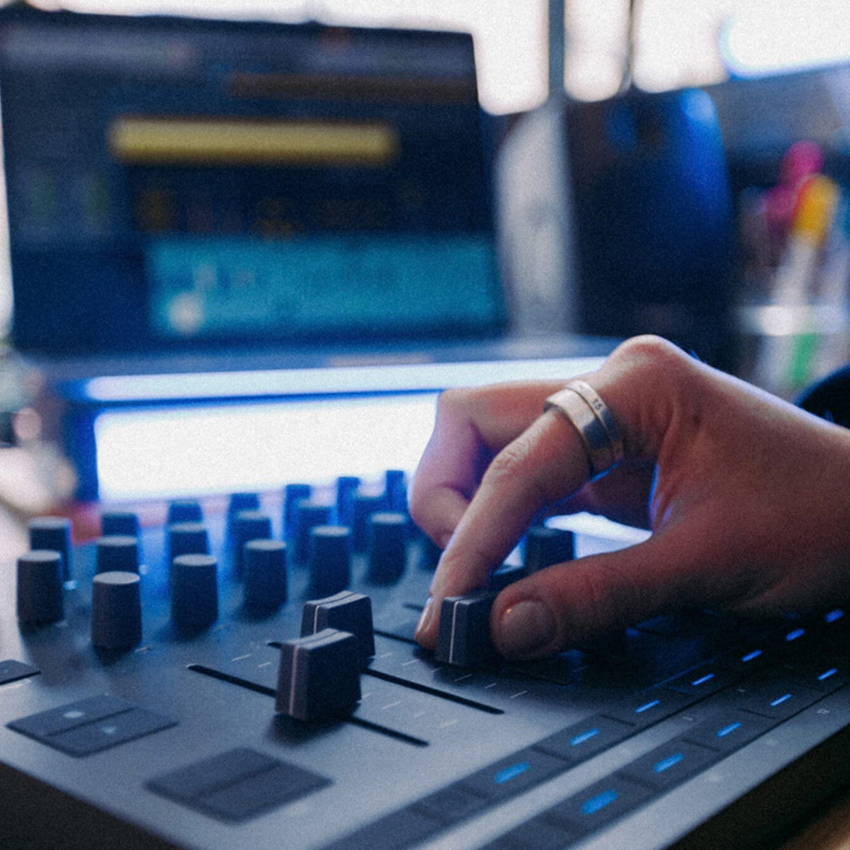 Novation Launch Control XL MK3 MIDI controller with colorful pads and knobs, used for music production and live performance.