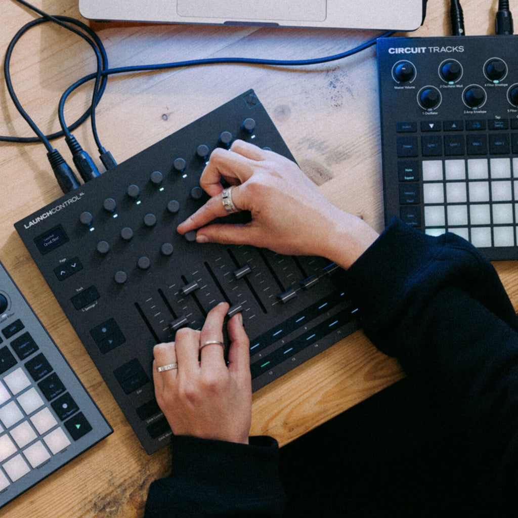 Novation Launch Control XL MK3 MIDI controller with various knobs and pads for music production and performance.