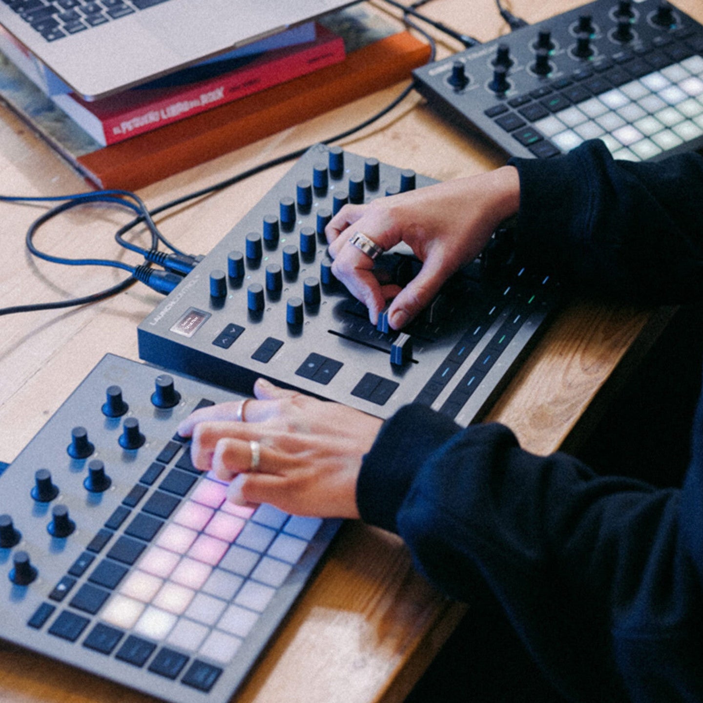 Novation Launch Control XL MK3 MIDI controller with multiple pads and knobs for music production and live performance.