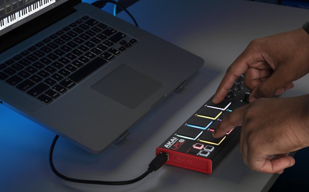 Akai Professional LPD8 MK2 MIDI controller with 8 drum pads and control knobs for music production and performance.