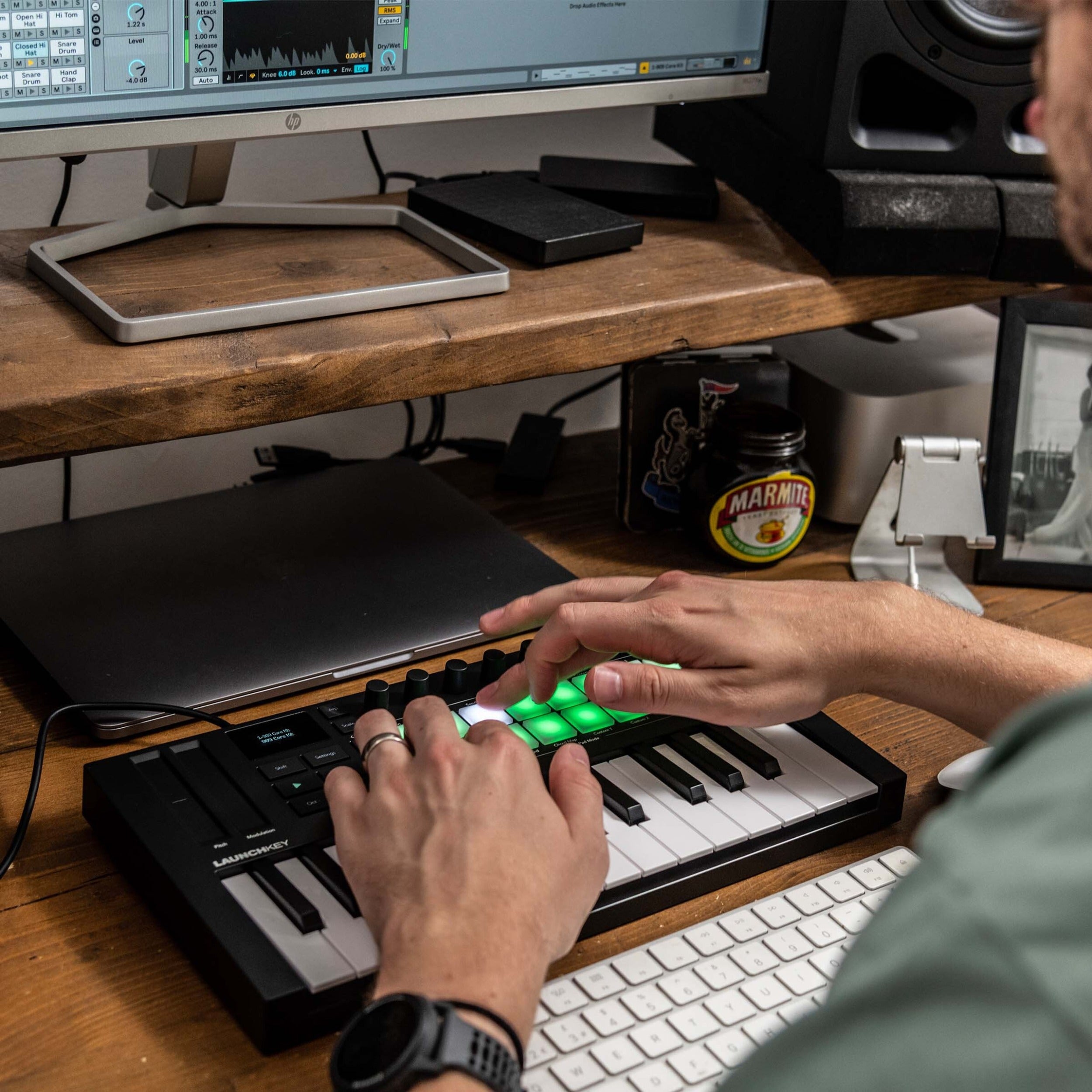 Novation Launchkey Mini 25 MK4 MIDI keyboard with 25 keys and control pads, designed for music production and live performance.
