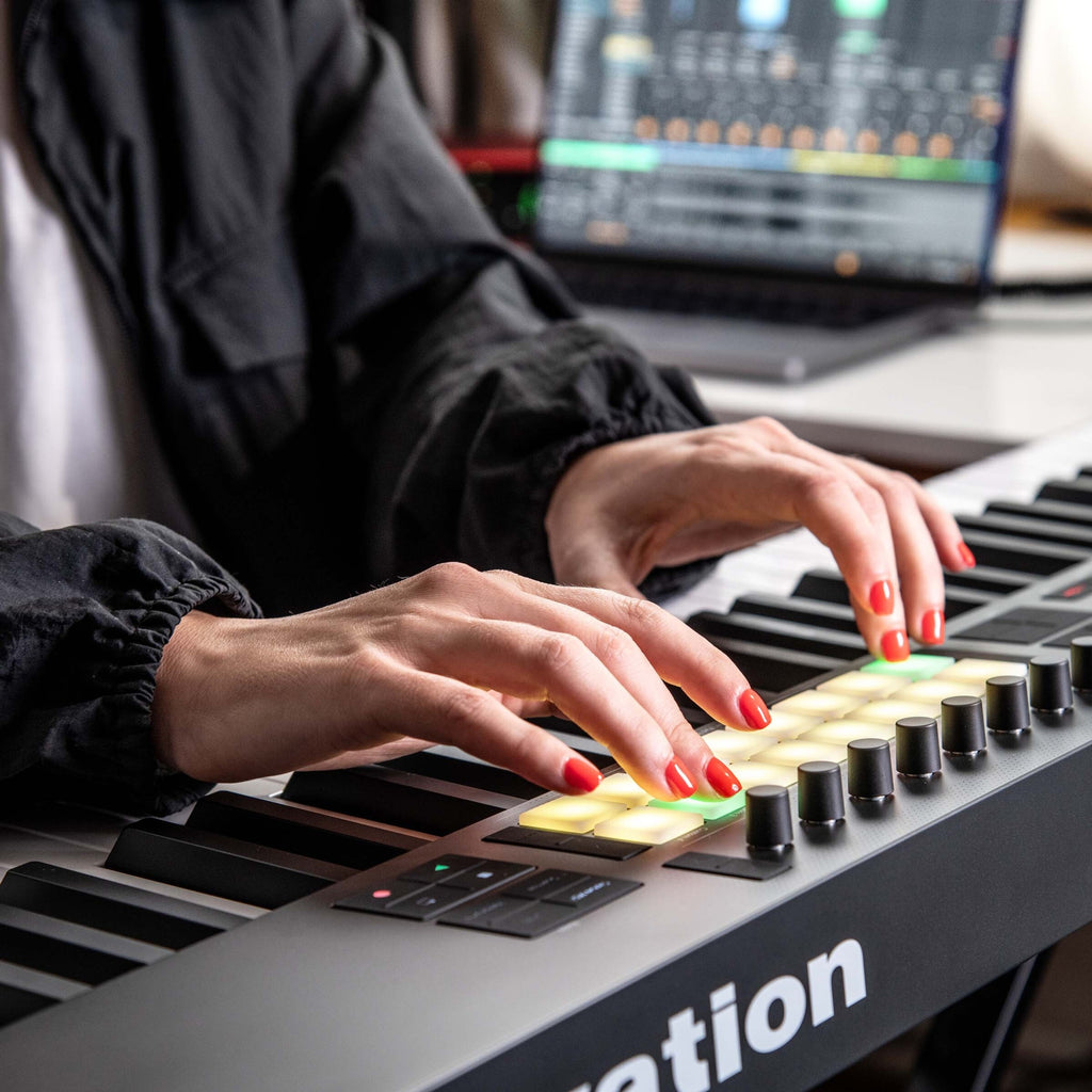 Novation Launchkey 49 MK4 MIDI keyboard with 49 keys, control knobs, and pads for music production and performance.
