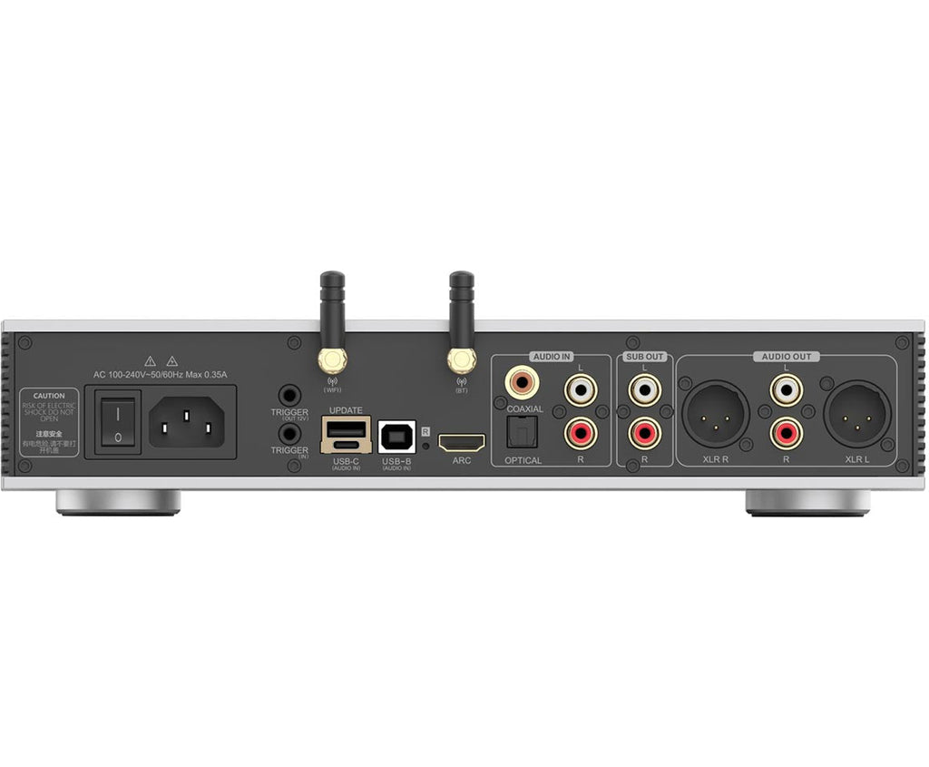Luxsin X9 headphone amplifier and DAC with sleek black design and multiple input ports for high-quality audio output.