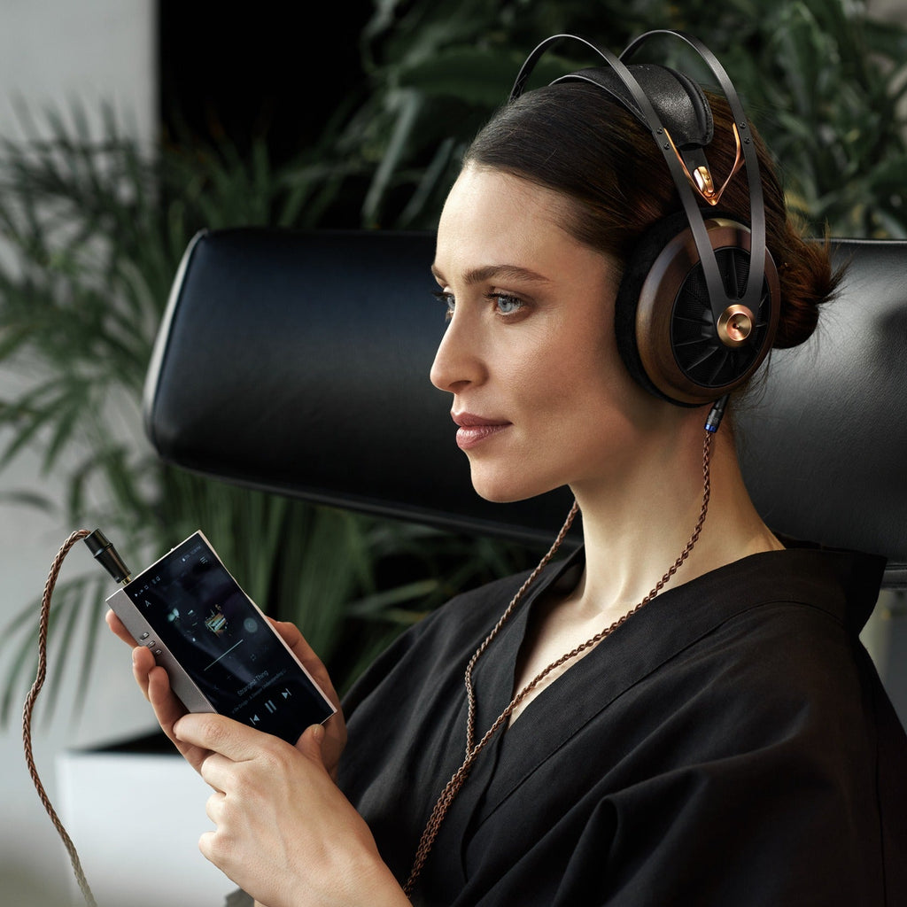 Wired Meze Audio 109 Pro headphones with black over-ear design and sleek metal accents, showing the ear cups and cable.