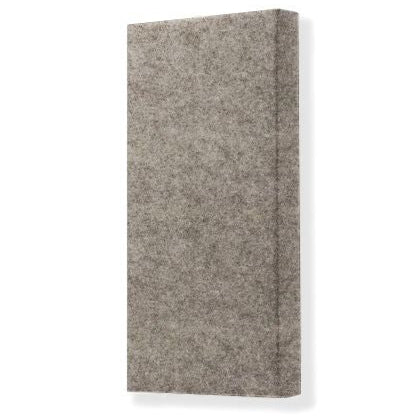 Megasonus POLY100 acoustic panel in a room, showcasing sound-absorbing foam with a textured surface for improved acoustics.