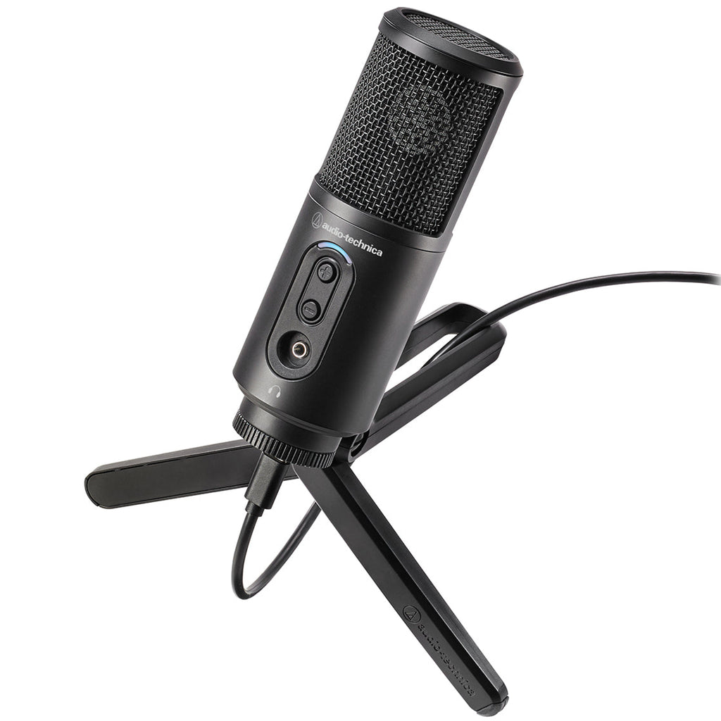 Audio Technica ATR2500x-USB USB microphone on a stand, featuring a black body and built-in control buttons for clear audio recording.