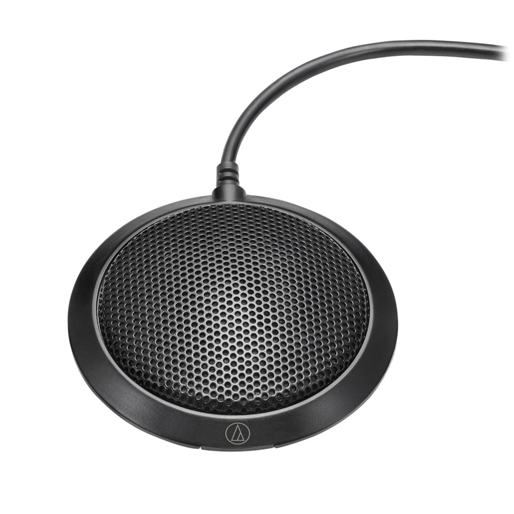 Audio Technica ATR4697-USB USB microphone mounted on a stand, featuring a sleek design for professional audio recording.