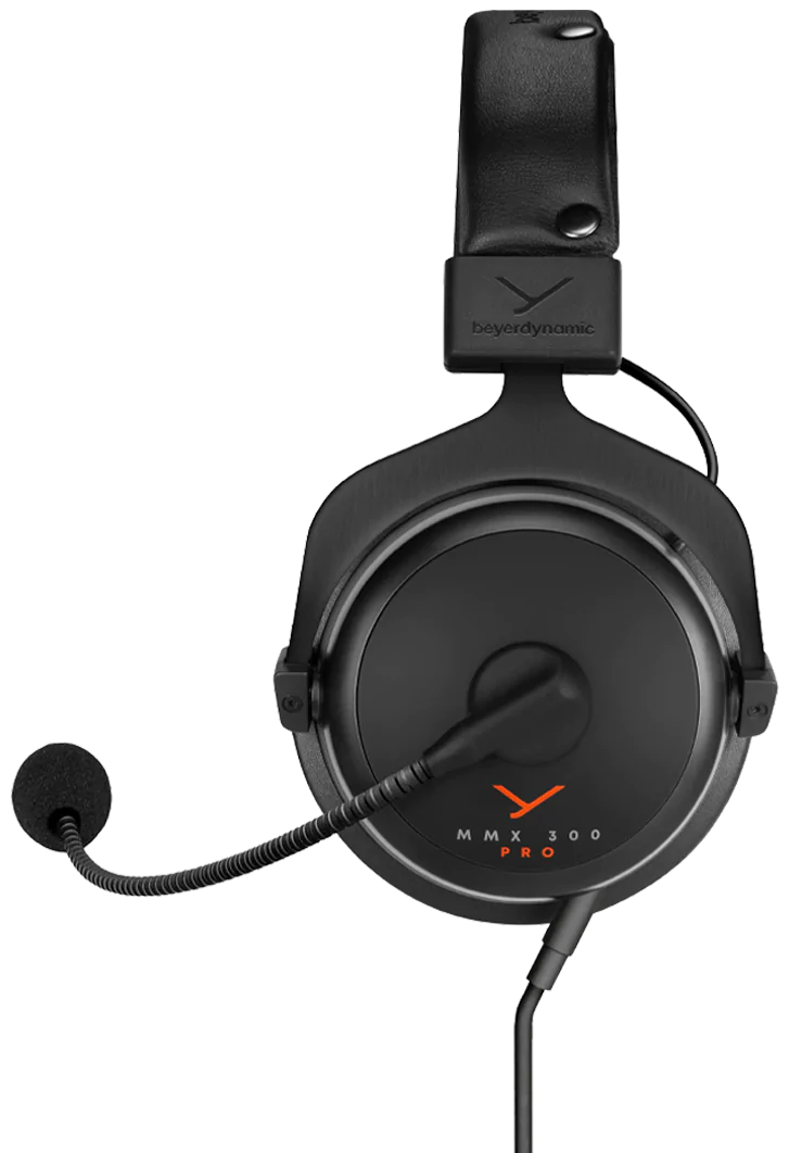 Beyerdynamic MMX 300 Pro gaming headphones with over-ear design, microphone, and adjustable headband, shown from the side.