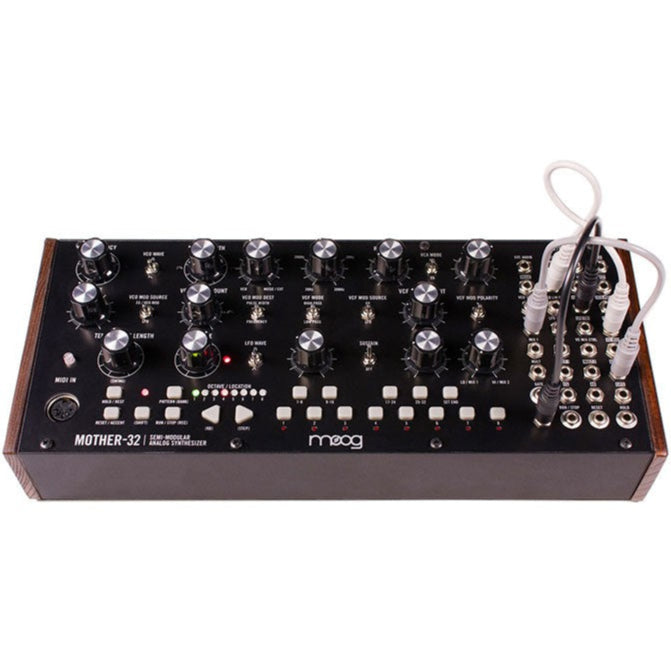 Moog Mother-32 semi-modular synthesizer with patch cables and control knobs, showcasing its front panel and interface.