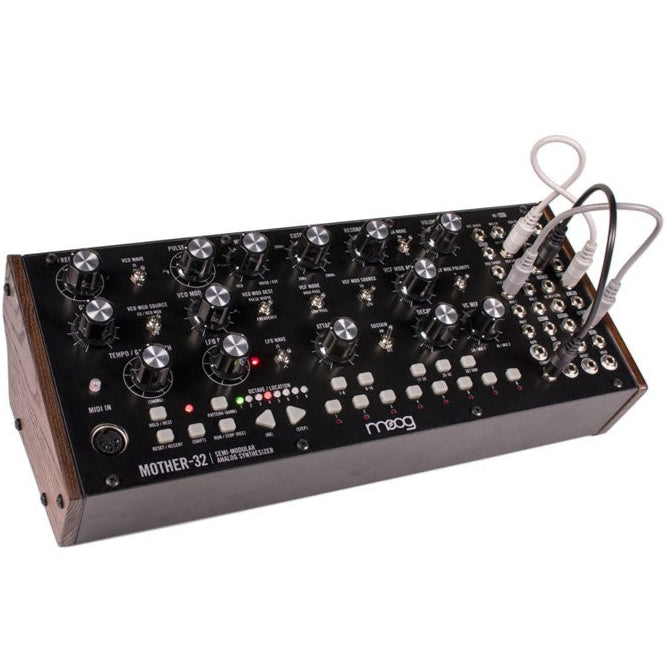 Moog Mother-32 semi-modular synthesizer with patch cables and control knobs, showcasing its front panel and patch bay.