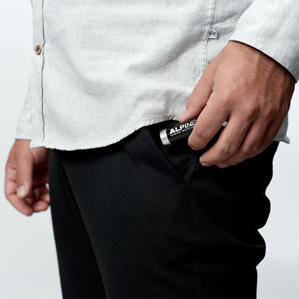 Alpine Music Safe Classic earplugs for hearing protection, shown in a compact storage case, designed for musicians and concerts.
