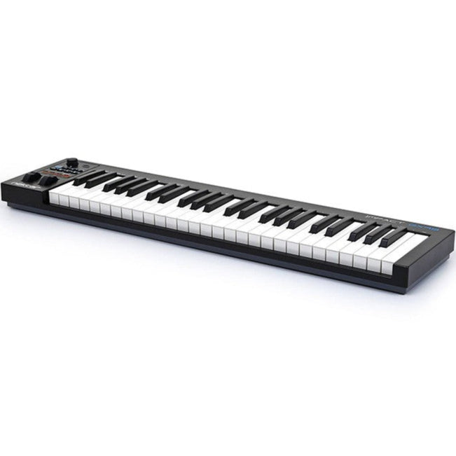 Nektar Impact GX49 midi keyboard with 49 keys, control knobs, and buttons, shown in a close-up view of the black and gray keyboard.
