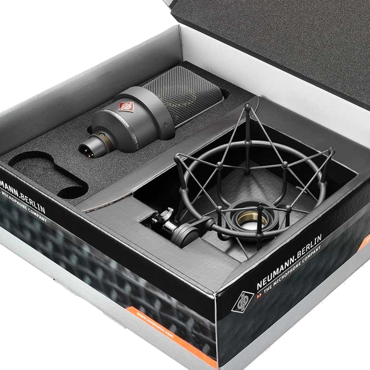 Neumann TLM 103 condenser microphone in its carton box, designed for studio recording and professional audio use.