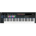 Novation 61SL MK3 MIDI keyboard with 61 keys, control knobs, and buttons, used for music production and digital composing.