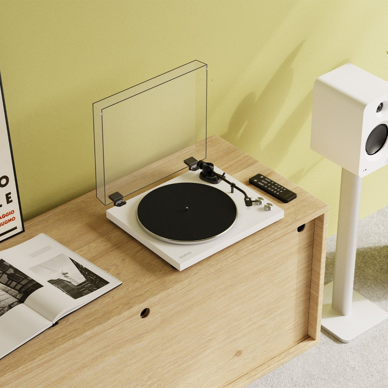 Kanto Audio OBI3 turntable with sleek black finish, placed on a modern wooden stand in a stylish living room setting.