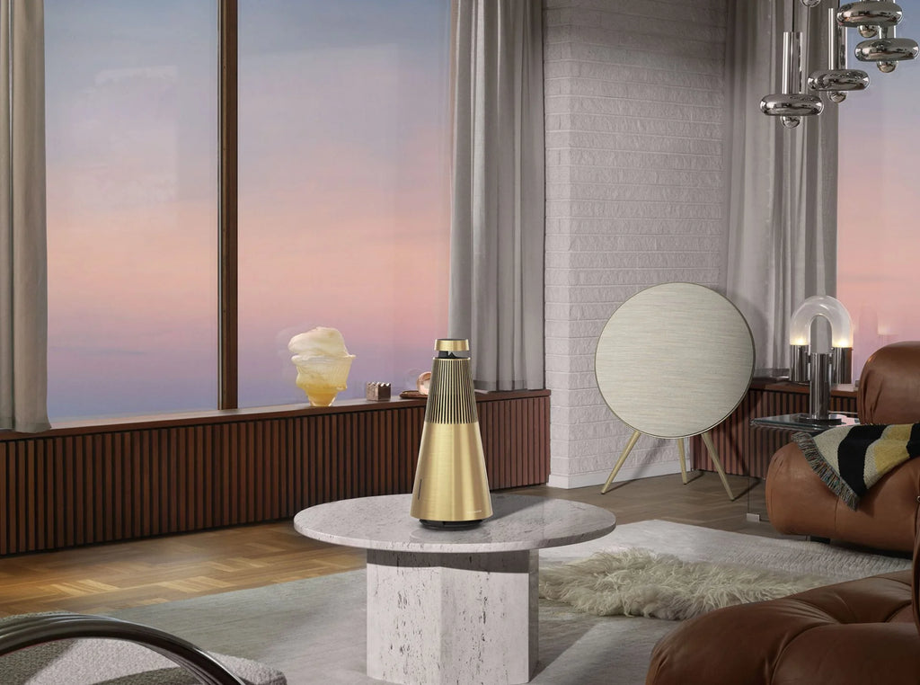 Bang & Olufsen Beosound A9 5th Gen wireless speaker with sleek design and wood finish, shown on a white background.