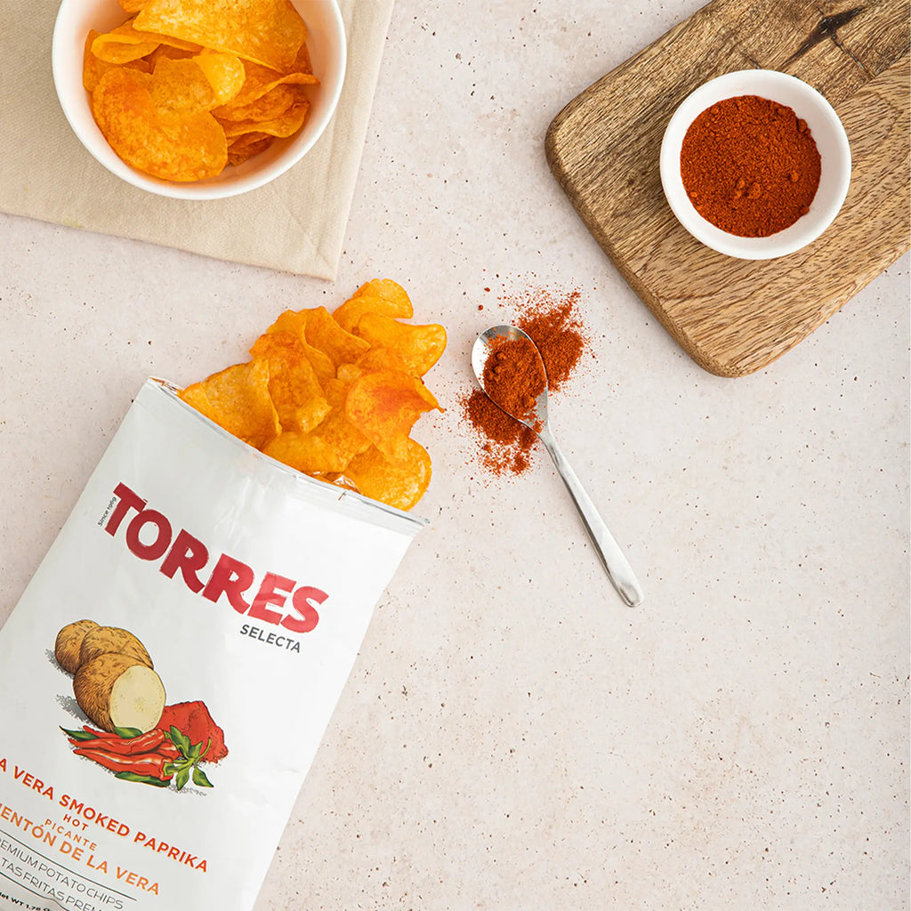 Patatas Torres De La Vera hot smoked paprika chips in a 150g bag, crispy potato chips flavored with smoky paprika.