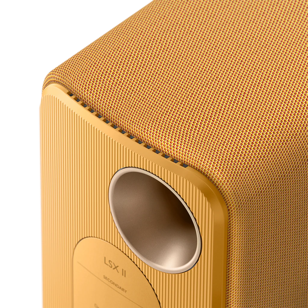 KEF LSX II active bookshelf speakers with sleek design and compact form, showcasing their modern black finish and front speaker grille.