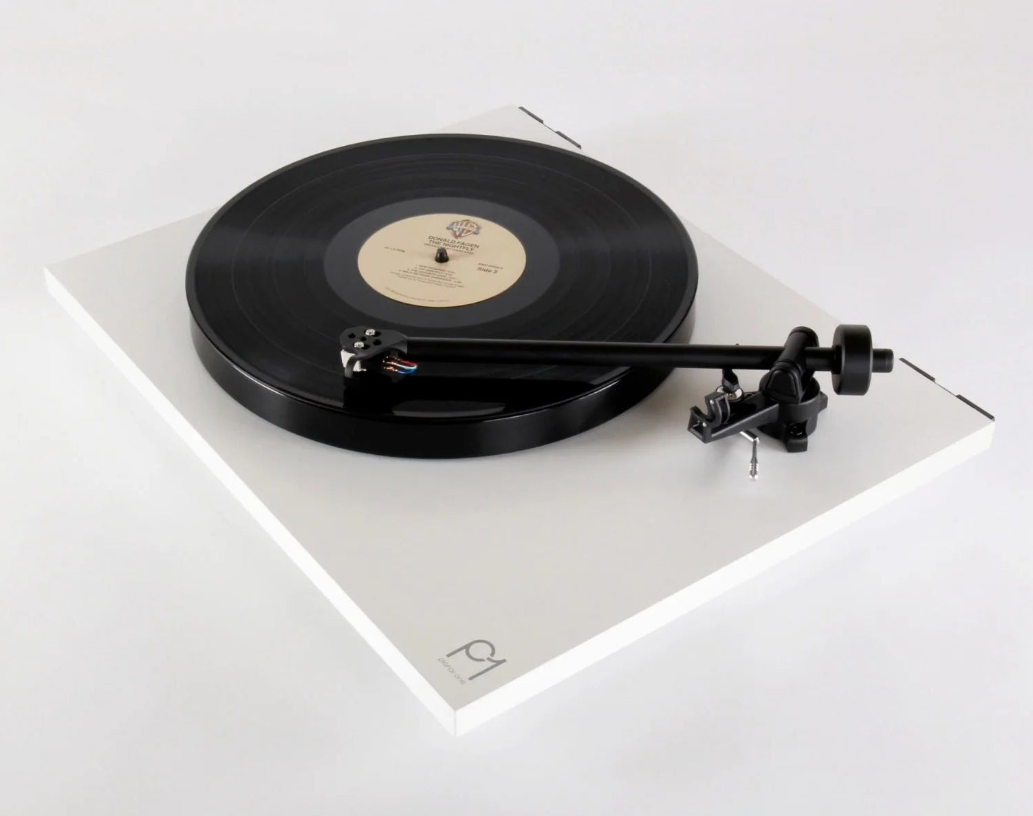 Rega Planar 1 turntable with matte finish, featuring a sleek design and tonearm, ideal for high-quality vinyl listening.