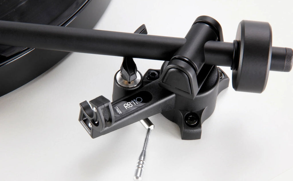 Rega Planar 1 turntable with matte finish, featuring a sleek design and tonearm for high-quality vinyl playback.