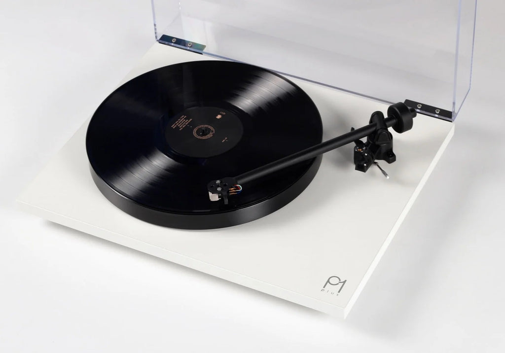Rega Planar 1 Plus turntable with matte finish, featuring tonearm and platter, designed for high-quality vinyl playback.