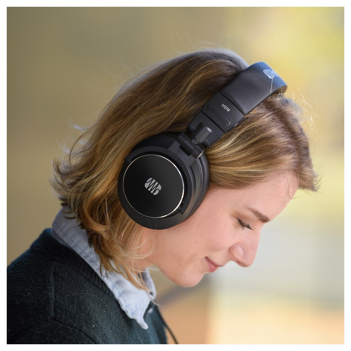 Presonus HD9 studio headphones with over-ear design, cushioned ear cups, and adjustable headband for professional audio monitoring.
