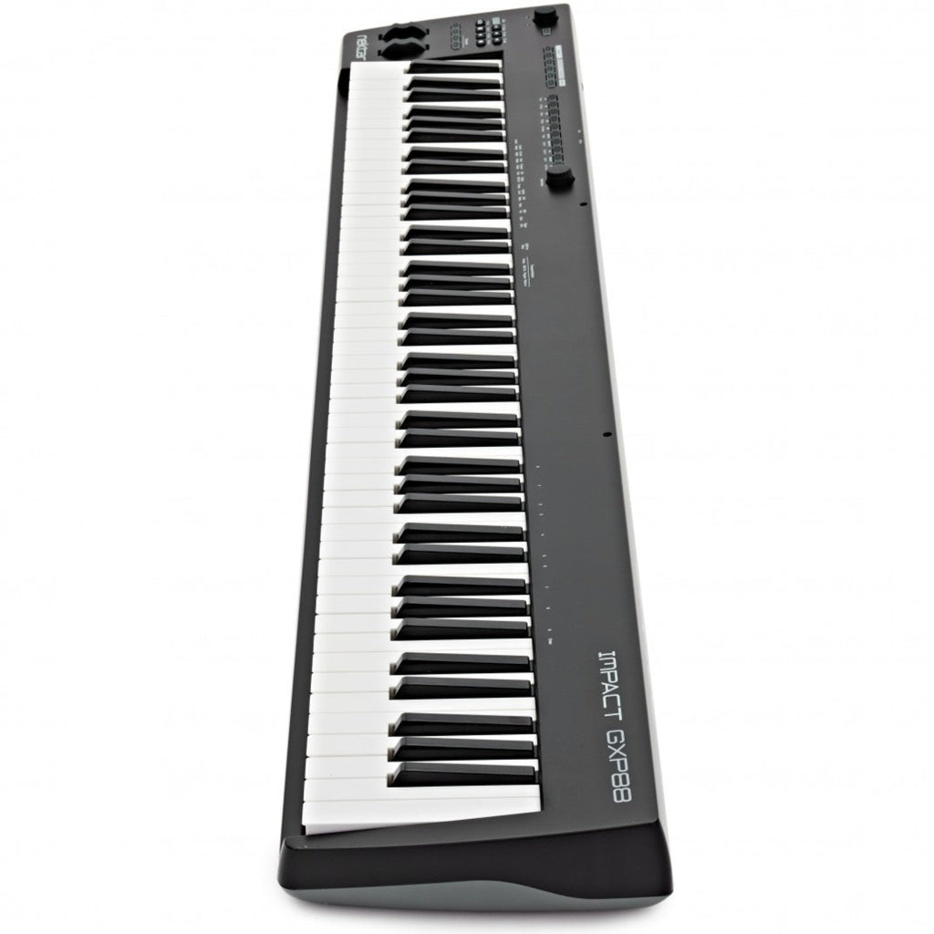 Nektar Impact GXP88 midi keyboard with 88 keys, control knobs, and pitch/mod wheels, shown in a close-up view.
